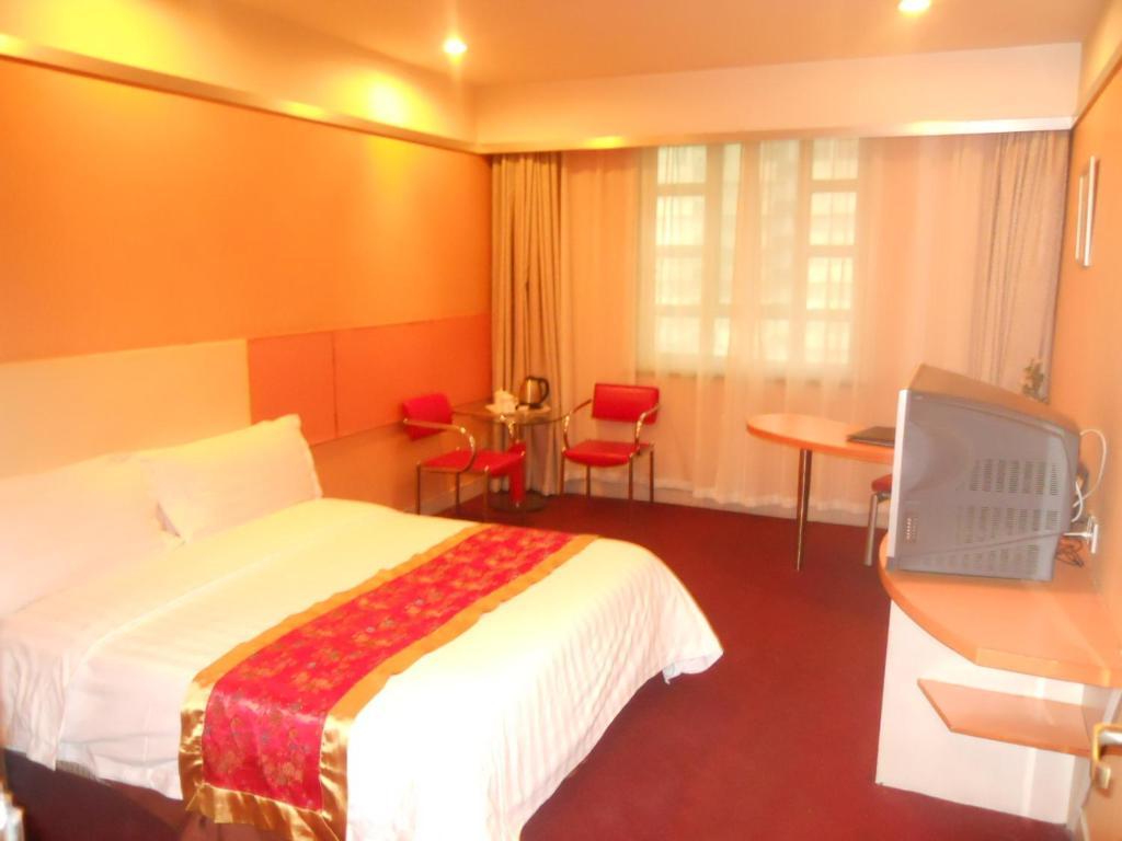 New Beacon Xinhang International Hotel Wuhan Zimmer foto