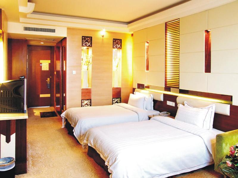 New Beacon Xinhang International Hotel Wuhan Zimmer foto